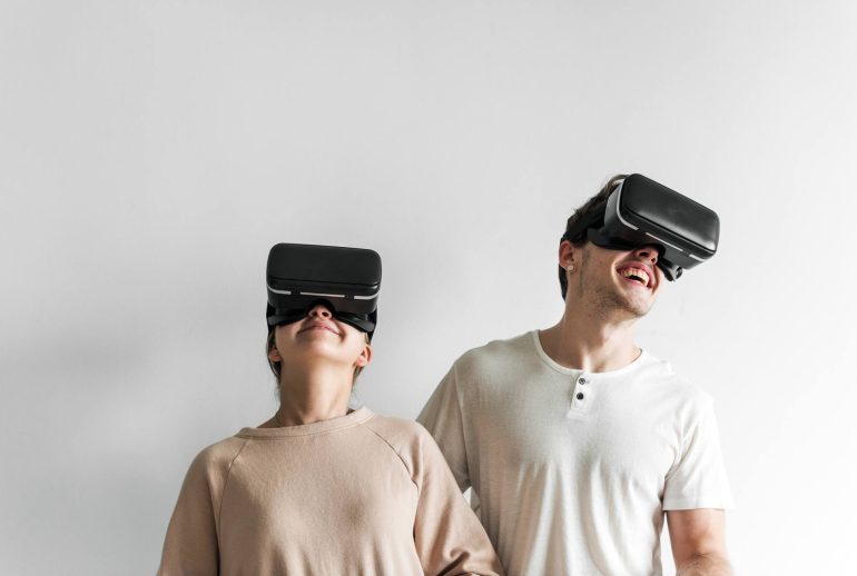 white couple experiencing virtual reality with vr AJZC7DN.jpg
